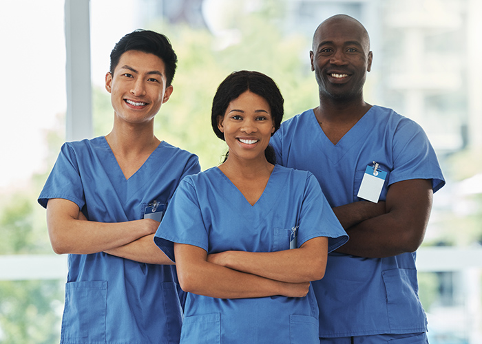 three international nurses smiling