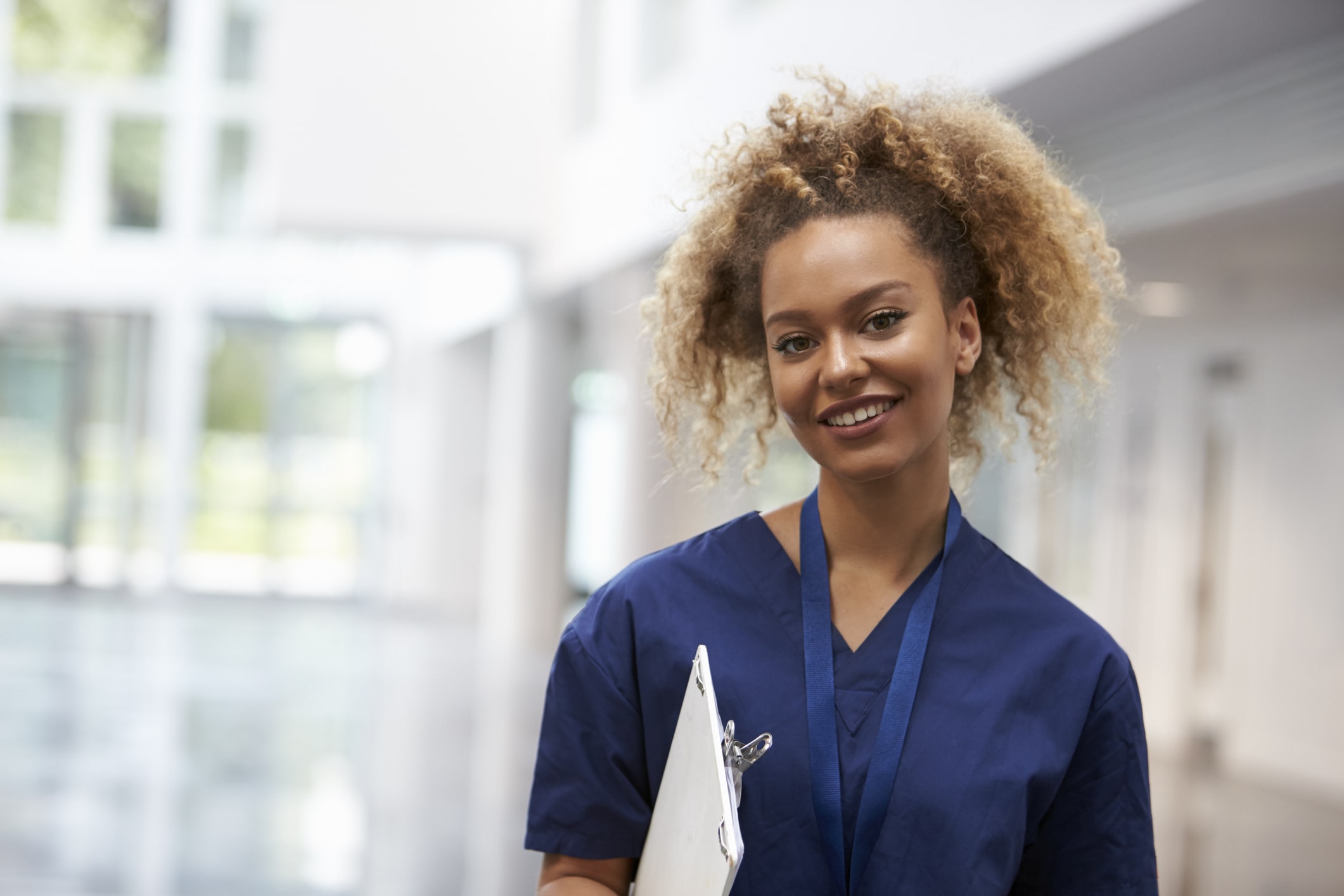 Female Nurse Wearing Scrubs in Hospital 